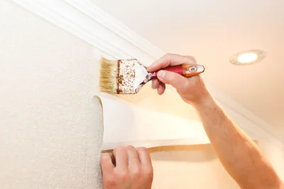 Pose de papier peint à Genêts — revêtements muraux et toiles de verre